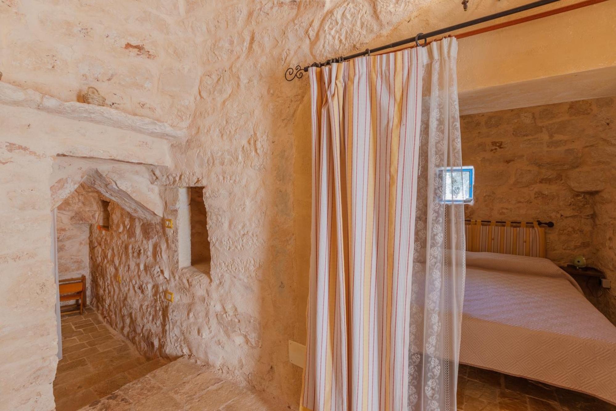 Trullo Tarantini Con Piscina Privata Lejlighed Latiano Eksteriør billede