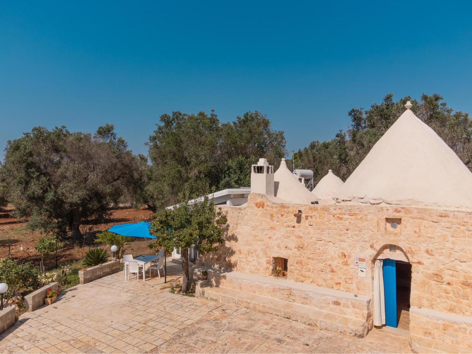 Trullo Tarantini Con Piscina Privata Lejlighed Latiano Eksteriør billede