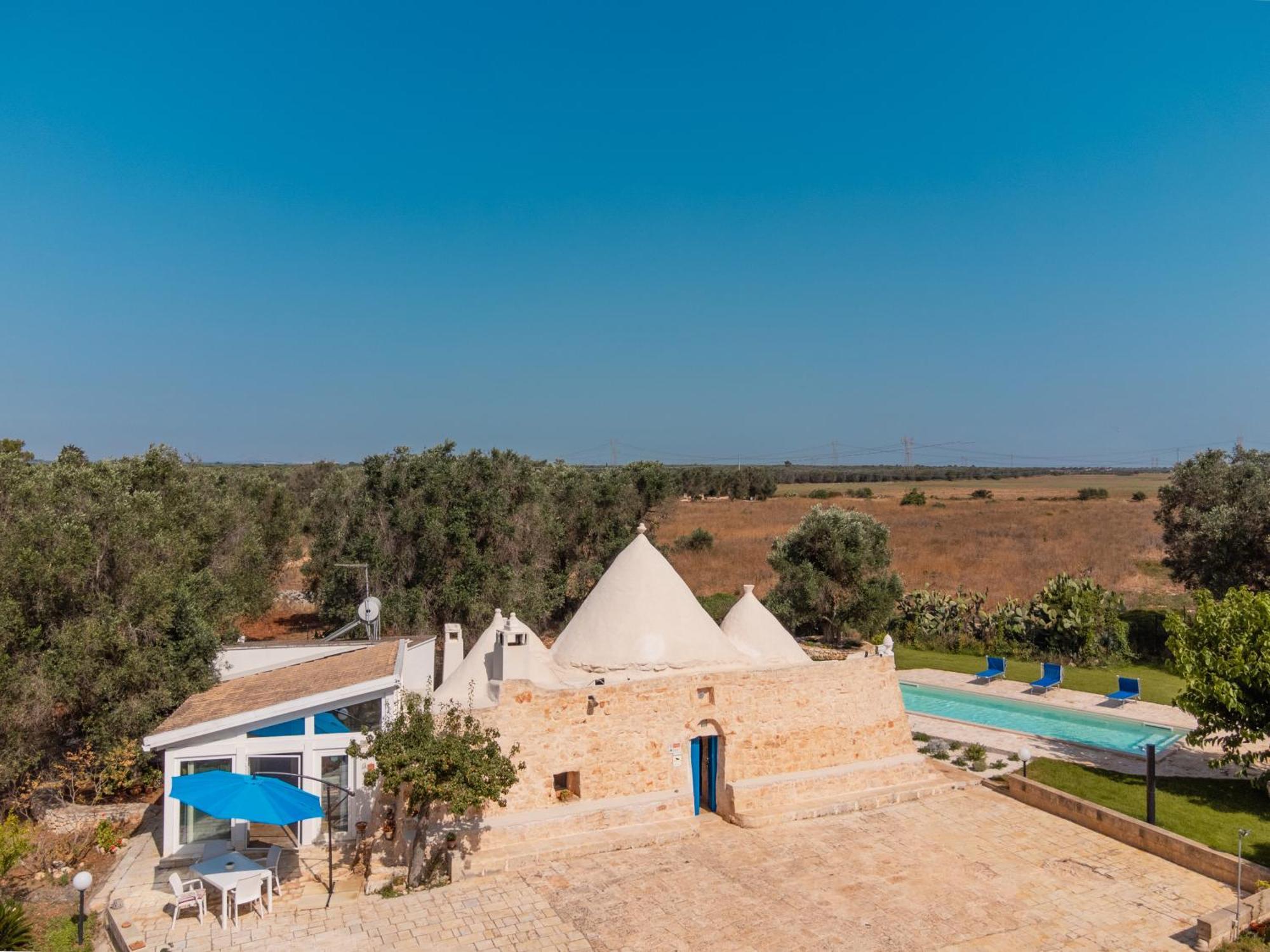 Trullo Tarantini Con Piscina Privata Lejlighed Latiano Eksteriør billede