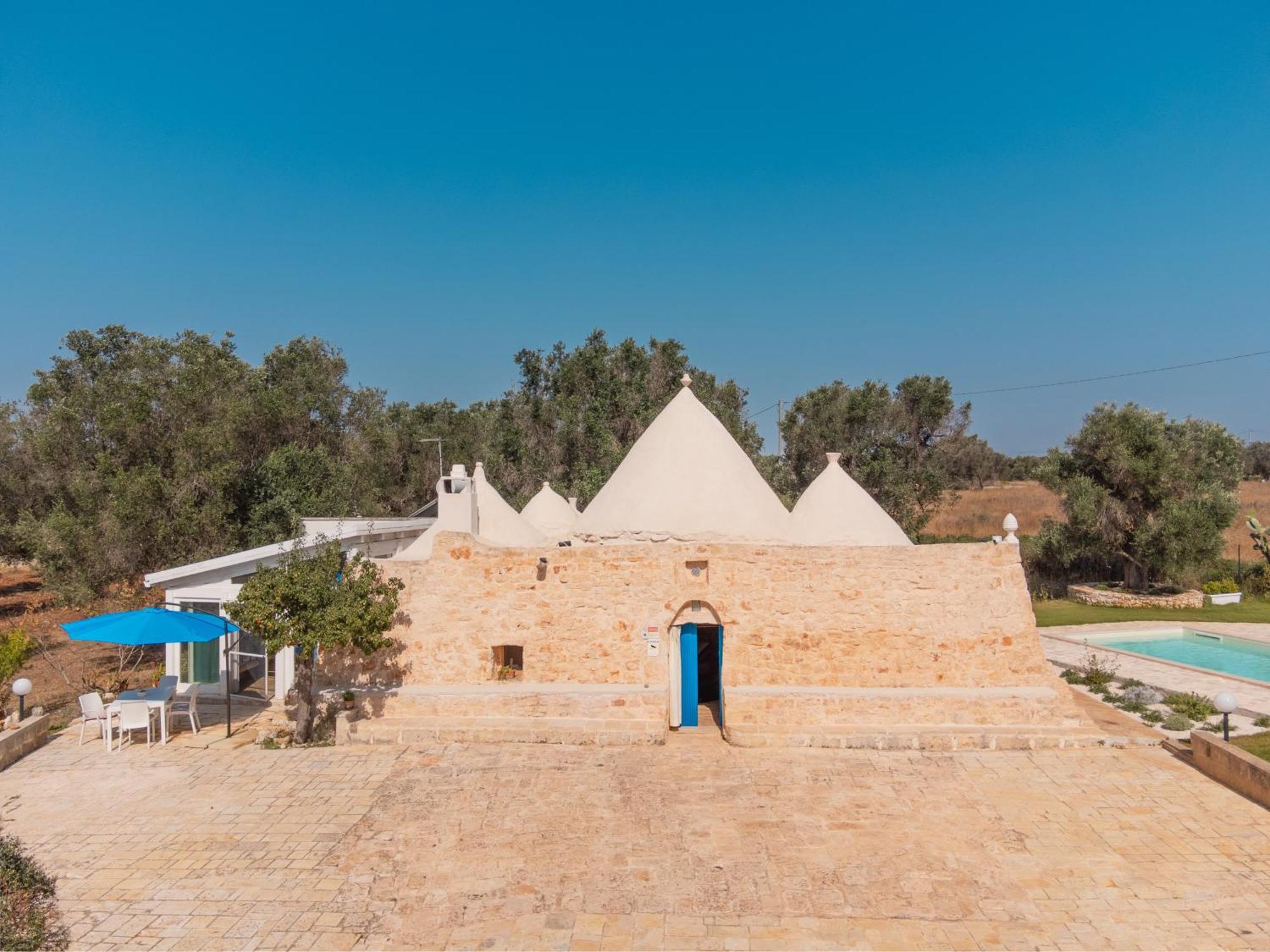 Trullo Tarantini Con Piscina Privata Lejlighed Latiano Eksteriør billede